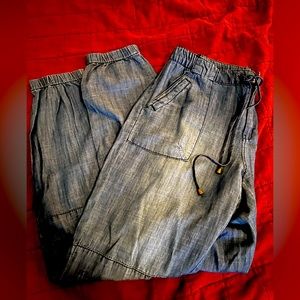 Medium wash jogger jeans.